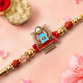 Shivling Pendant Rakhi with Blue Enamel Accent and Rudraksha Beads