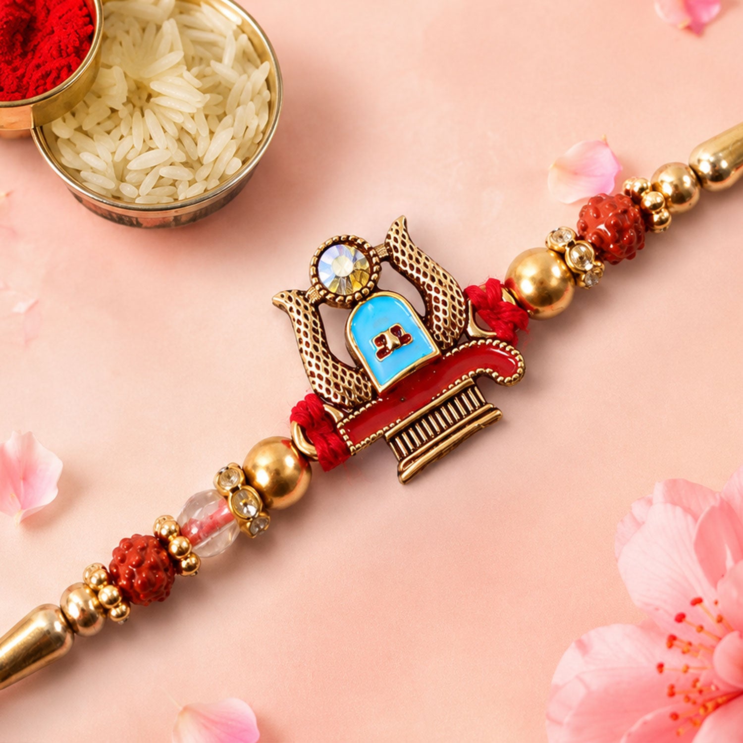 Shivling Pendant Rakhi with Blue Enamel Accent and Rudraksha Beads