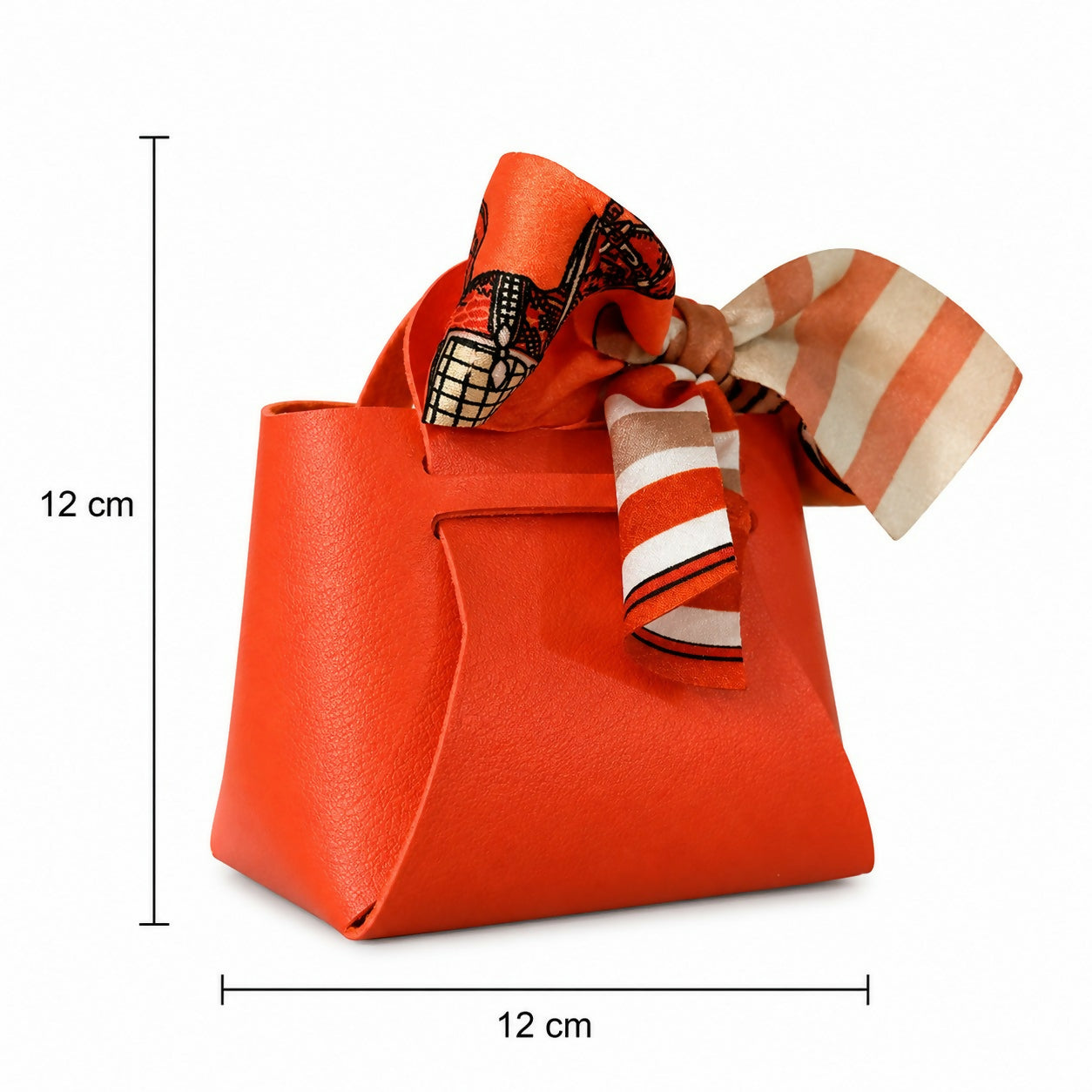 Orange mini handbag with textured finish and ribbon bow
