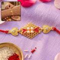 Kundan Rakhi – Elegant Pearl & Gold Charms for Sister’s Gift