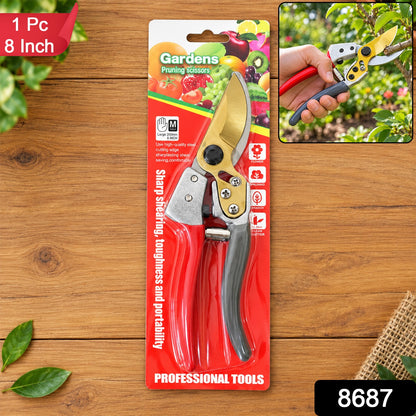 Packaged red and grey pruning shears with golden blades, with an inset image of the tool in use.