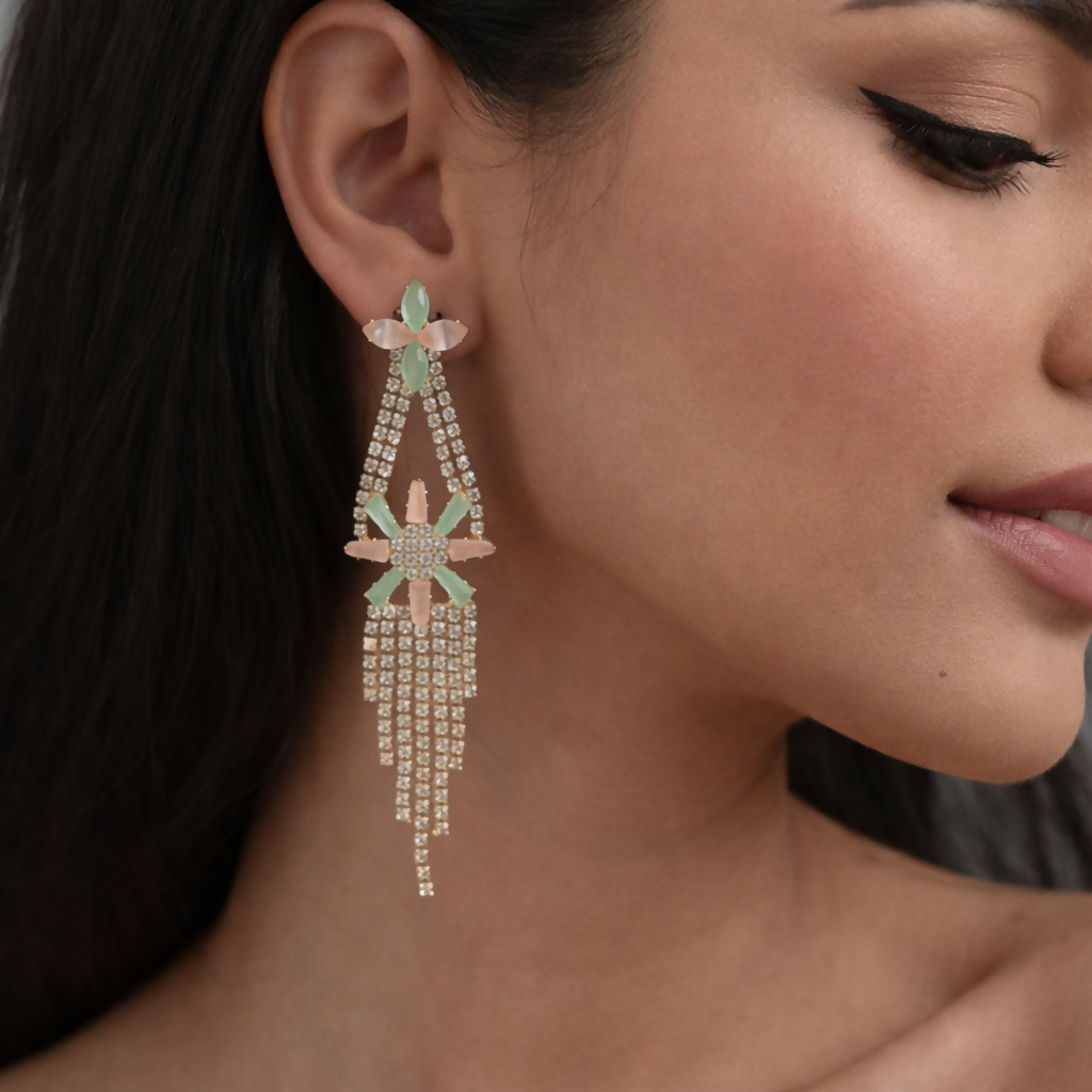 Elegant earrings featuring mint green and blush pink stones with sparkling crystals