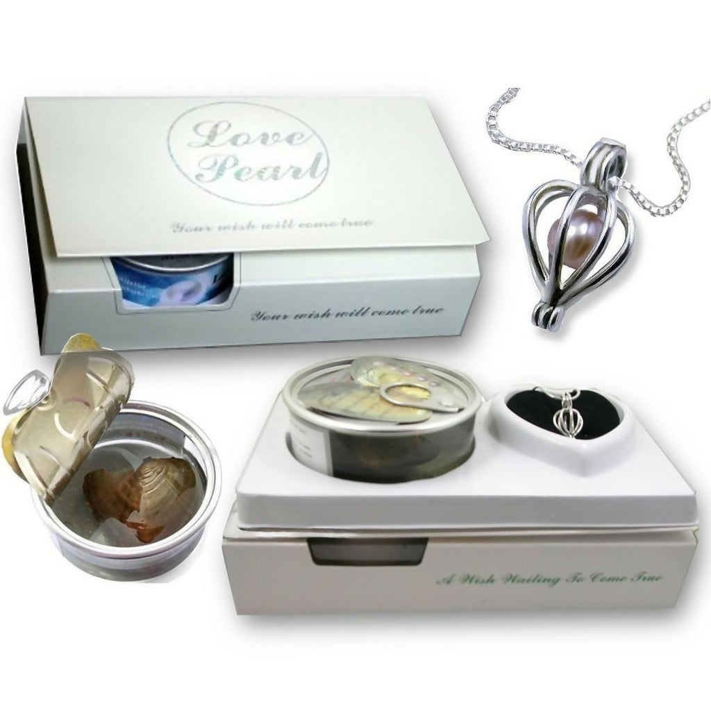 A white box containing a pearl pendant, chain, and an open can with an oyster inside.