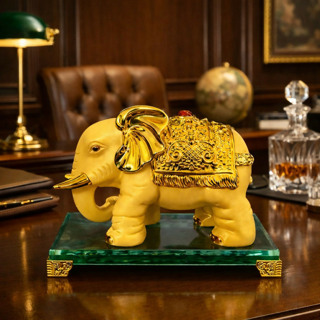 Side view of golden elephant decor statue with intricate detailing