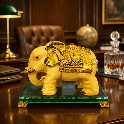 Side view of golden elephant decor statue with intricate detailing