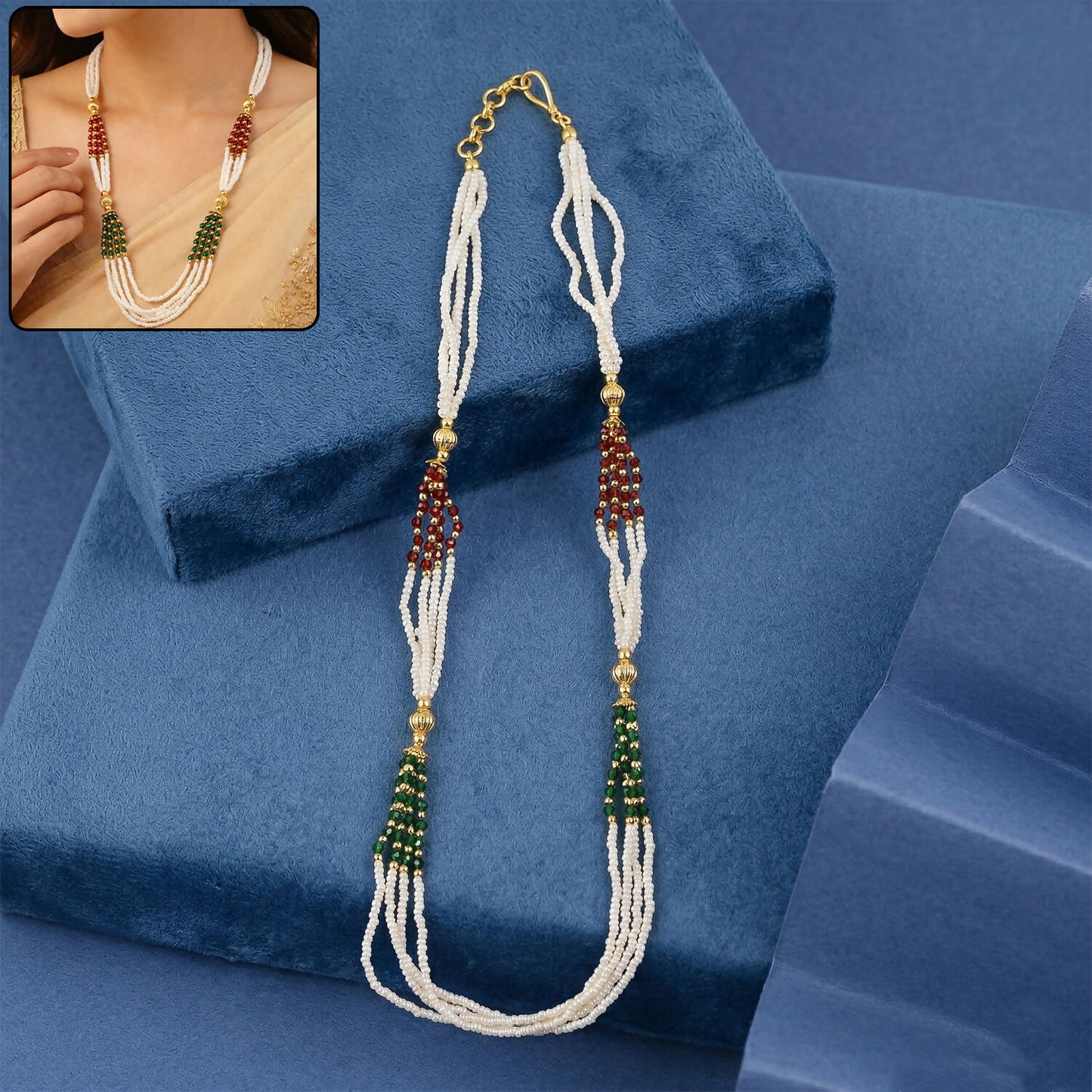 Traditional white multi-strand beaded mala necklace with red and green accents