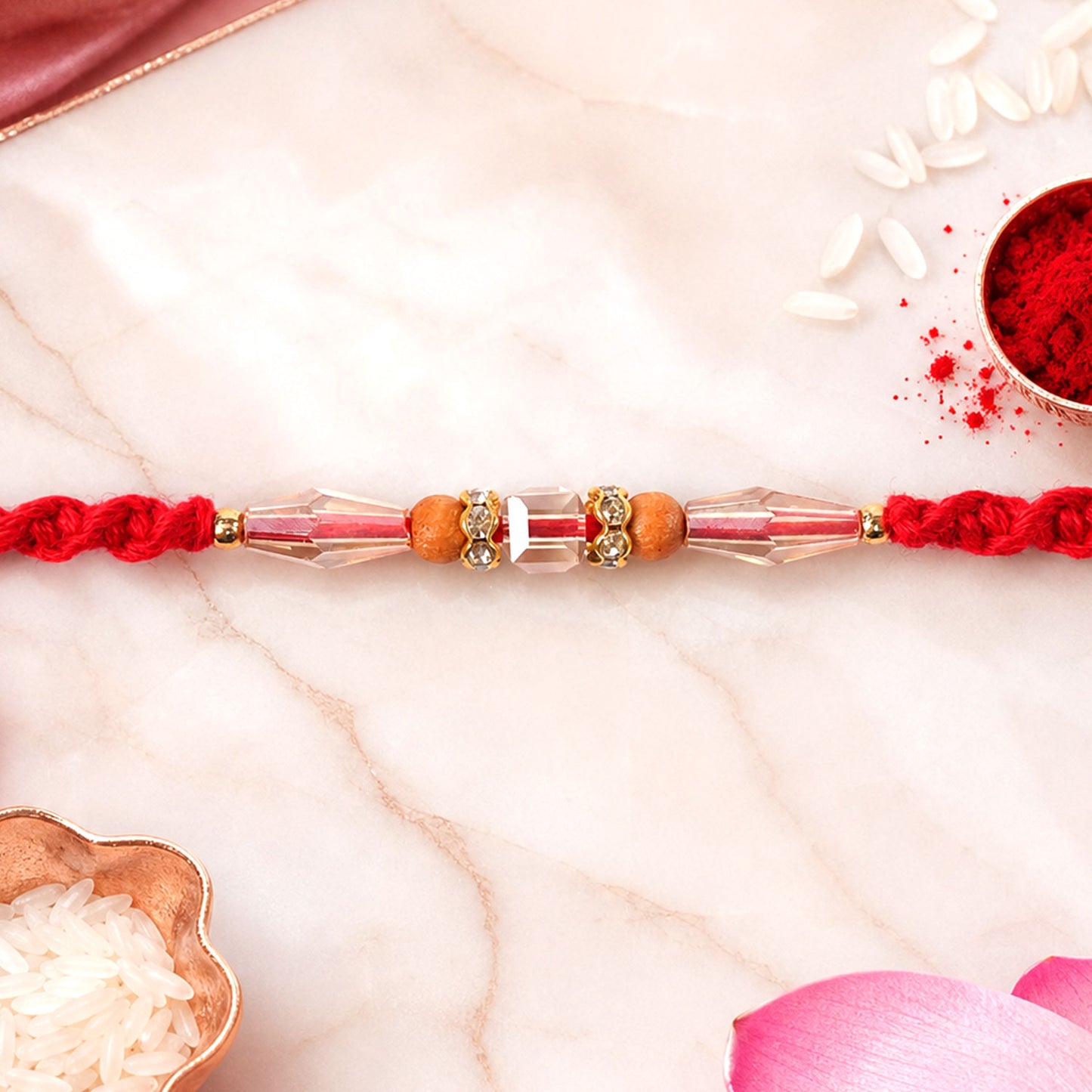 Red Thread Rakhi with Champagne Crystal Beads and Wooden Bead Accents