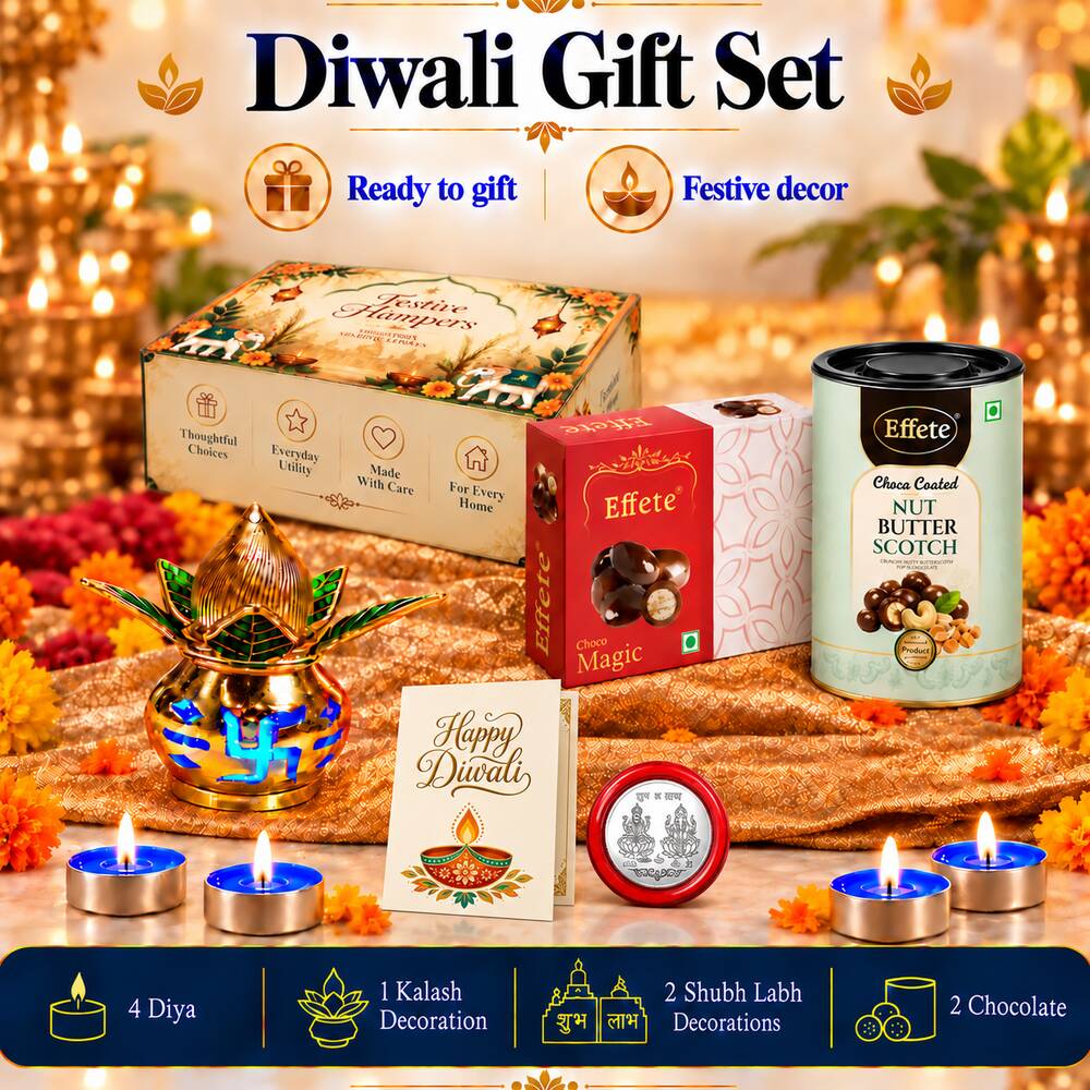 A Diwali gift set with a decorative box, sweets, a golden diya, and tealights, on a textured surface with warm lighting.