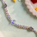 Pastel Braided Rakhi with Blue-White Thread and Crystal Bead Charm for Raksha Bandhan