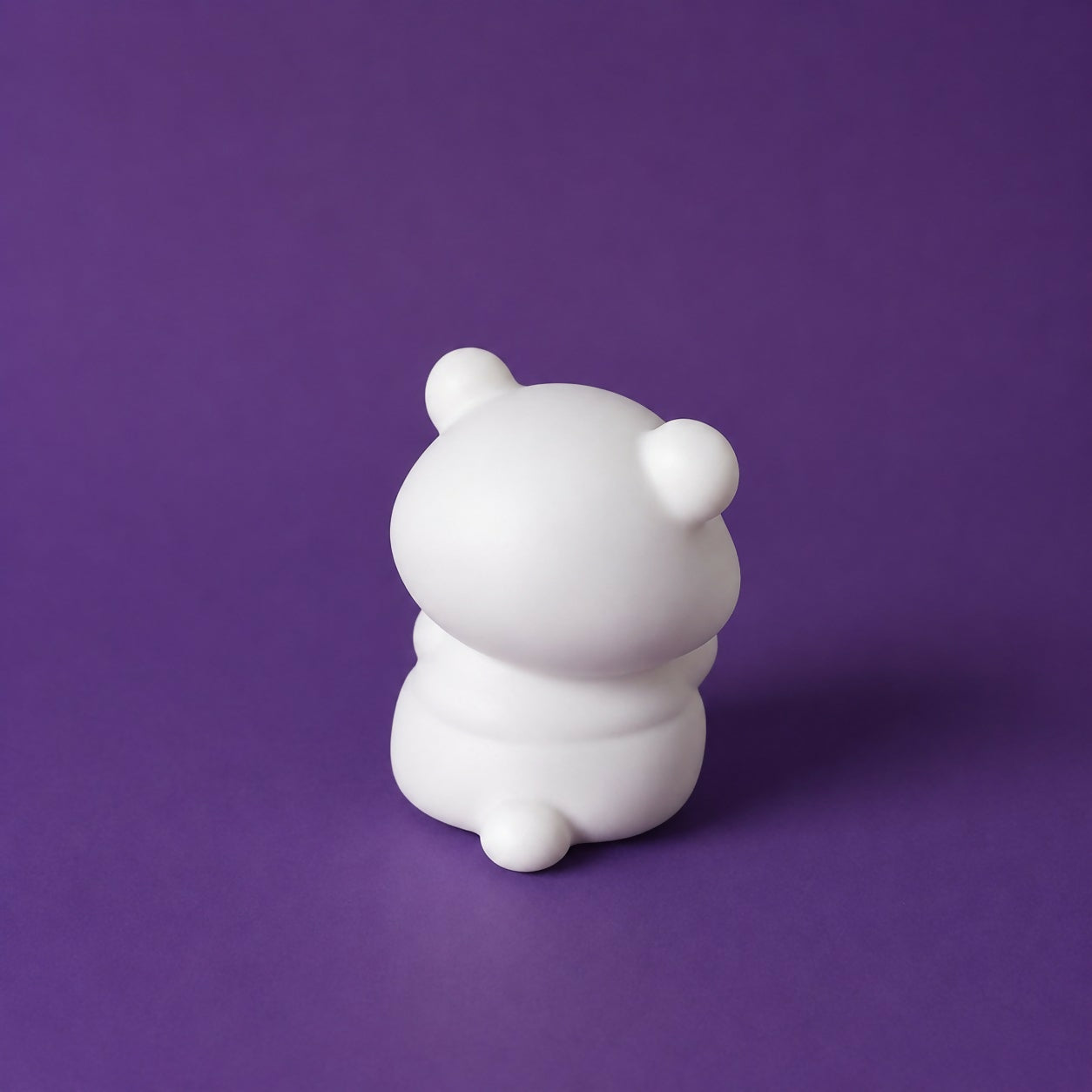 Close-up of silicone panda lamp texture and warm light