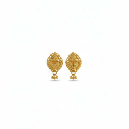 Golden jhumka earrings styled with Indian ethnic outfit for women and girls
