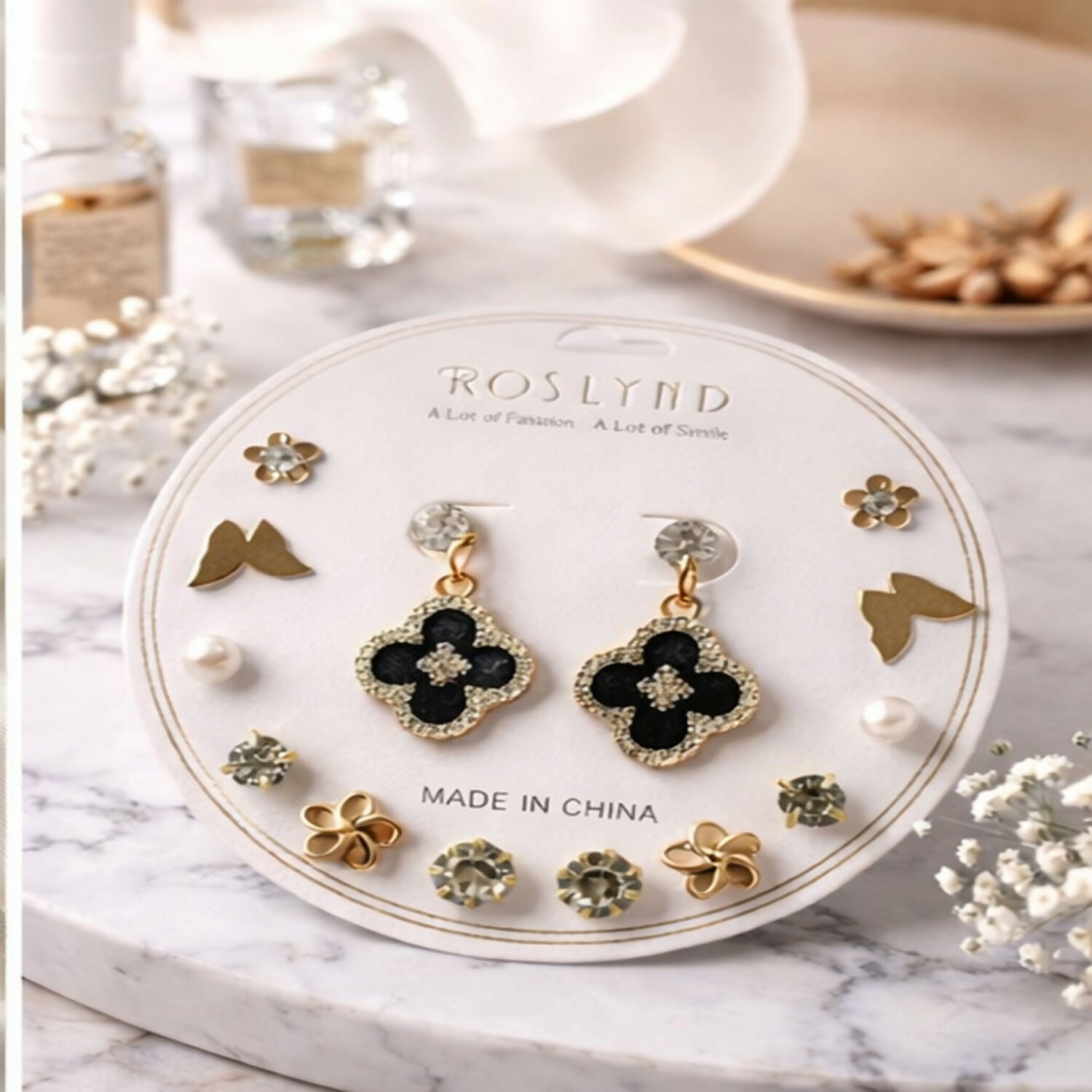 Pearl and crystal flower stud earrings from the versatile 7-piece earrings set