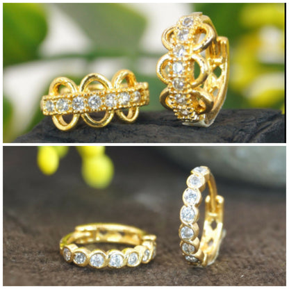 Gold plated huggie hoop earrings with double row cubic zirconia and triple dangle detail