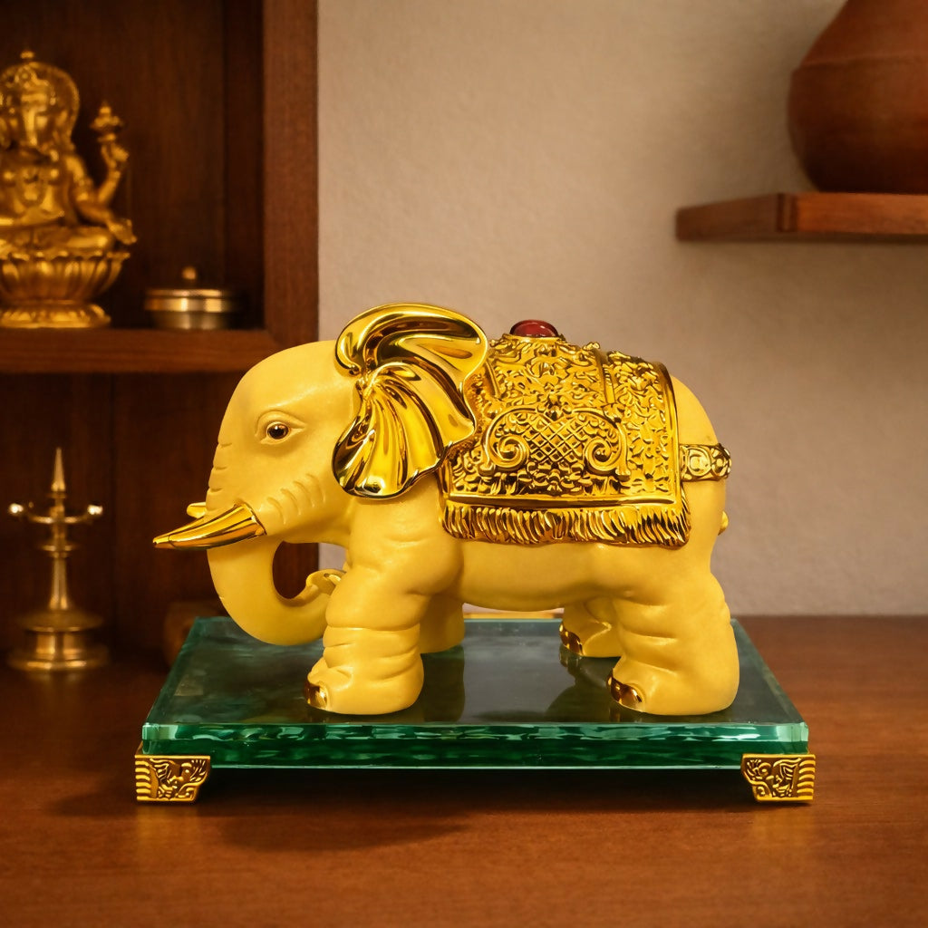 Golden elephant decorative showpiece on sturdy base front view