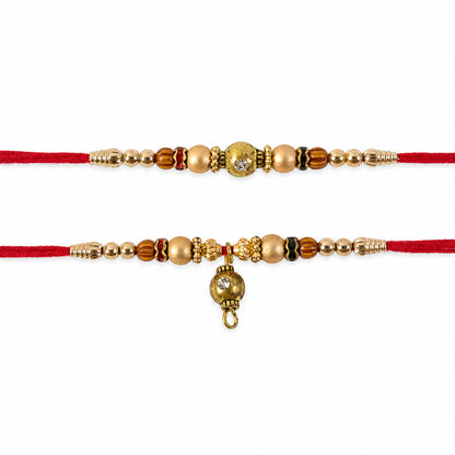 Golden Orb Couple Rakhi Set with Amber Beads and Hanging Charm for Bhaiya Bhabhi
