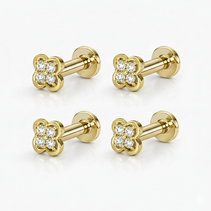 Two pairs of gold plated clover stud earrings featuring a shiny polished finish