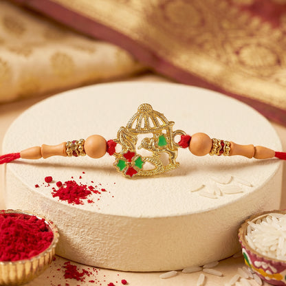 Golden Bow and Arrow Rakhi for Boys with Red Thread and Beads