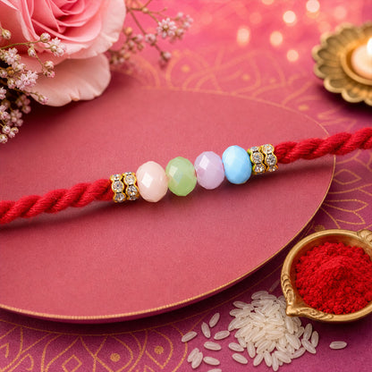 Red Twisted Cord Rakhi with Soft Pastel Multicolour Bead Accents