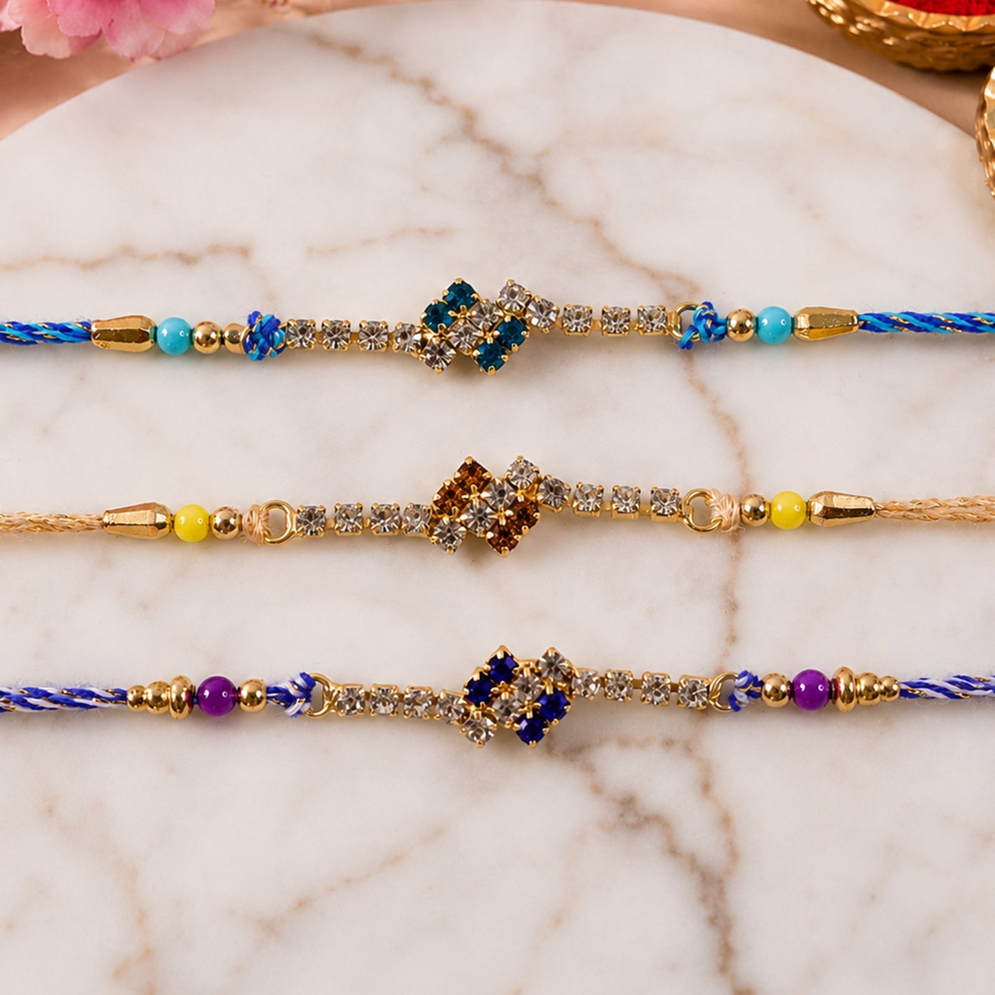 Compact Square Stone Rakhi in Mix Colour Threads (Pack of 6)