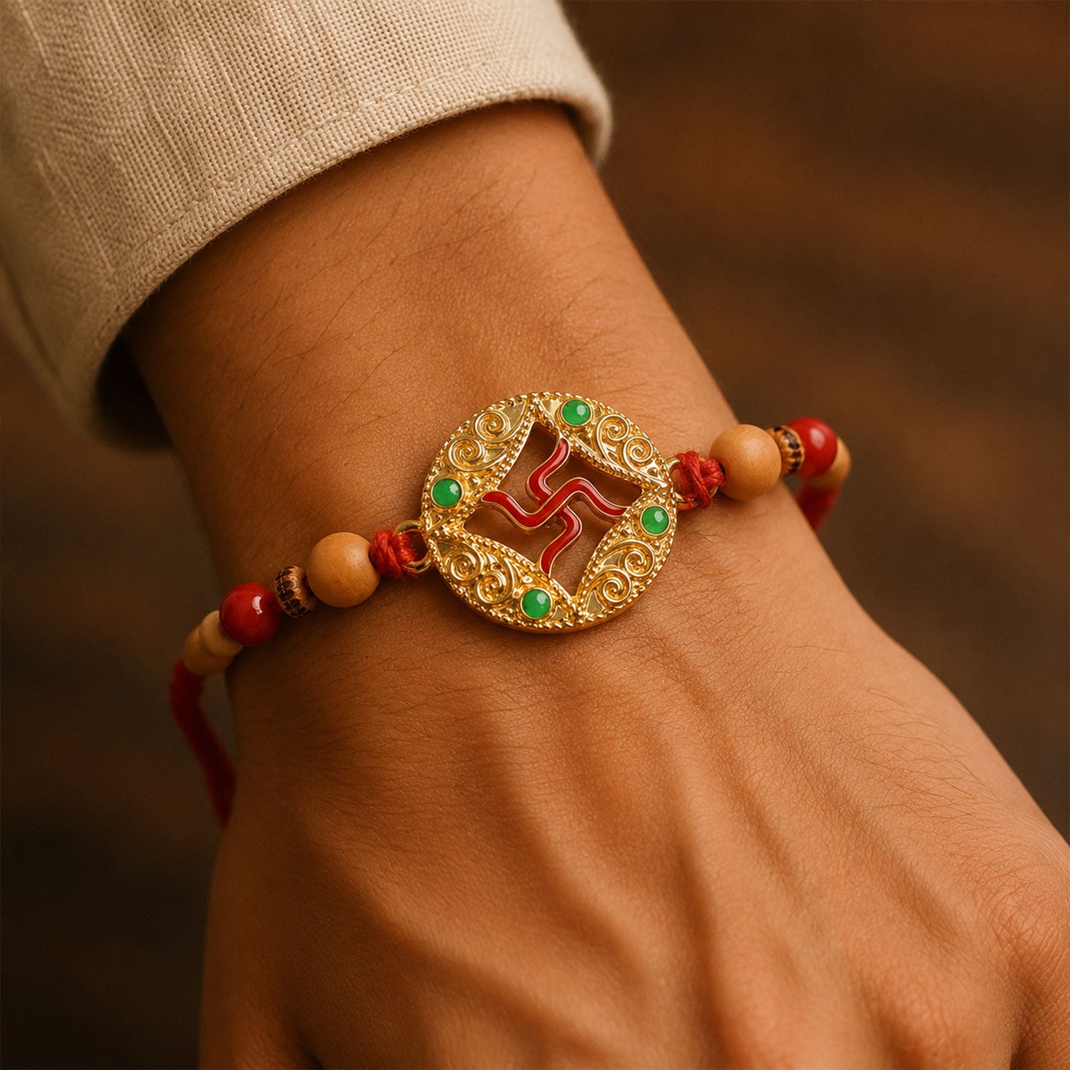 Multicolor Swastik Rakhi with Peach Beads and Navy Backdrop