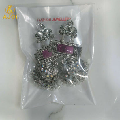 Royal Heirloom Oxidized Silver Jhumka Earrings with Blush Pink Stone, Intricate Hand-Engraved Motifs, Crystal Accents & Pearl Drop Fringe.