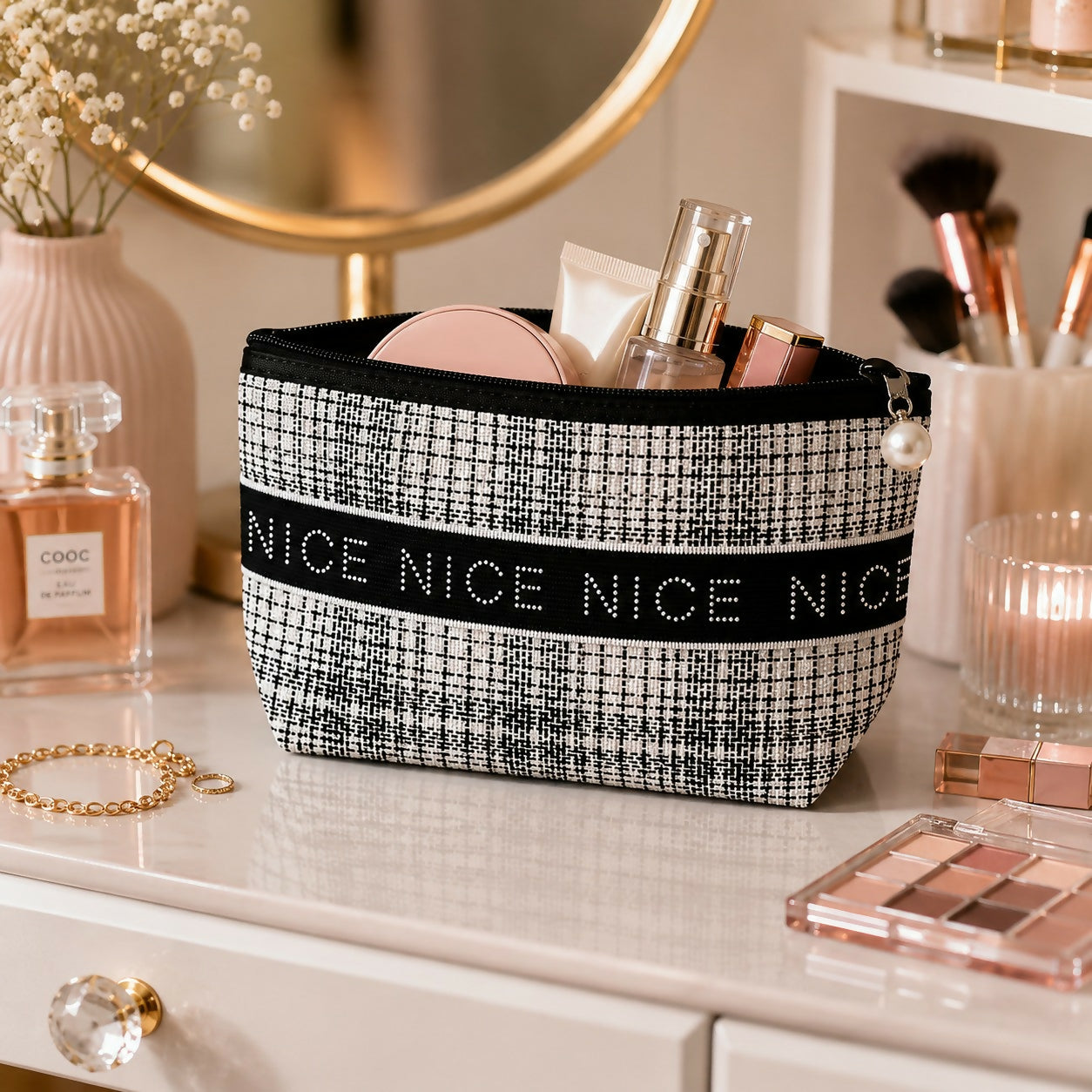 Portable cosmetic pouch with textured fabric and zipper
