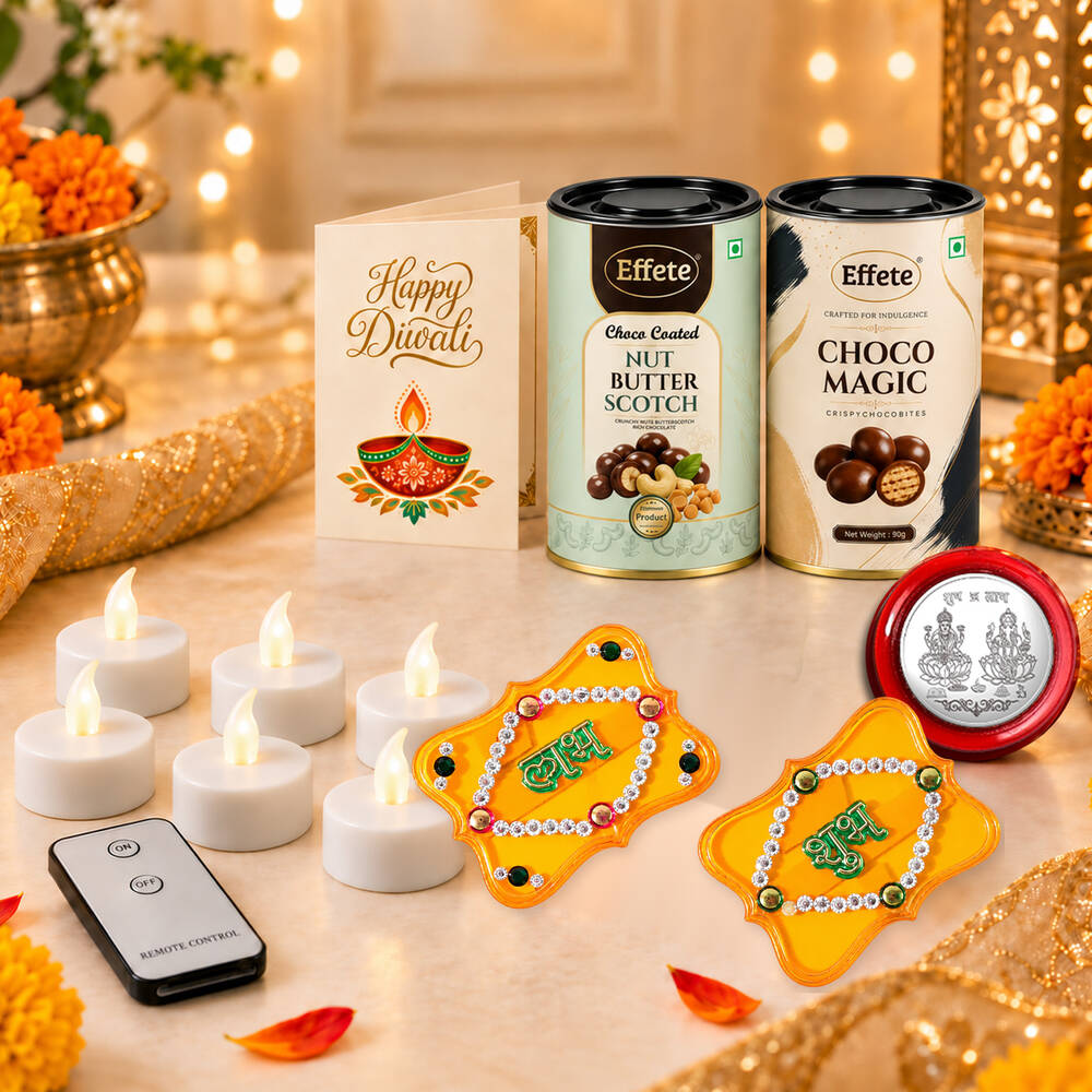 A festive arrangement of Diwali items on a gold fabric, including chocolates, LED candles, and decorative pieces with bokeh