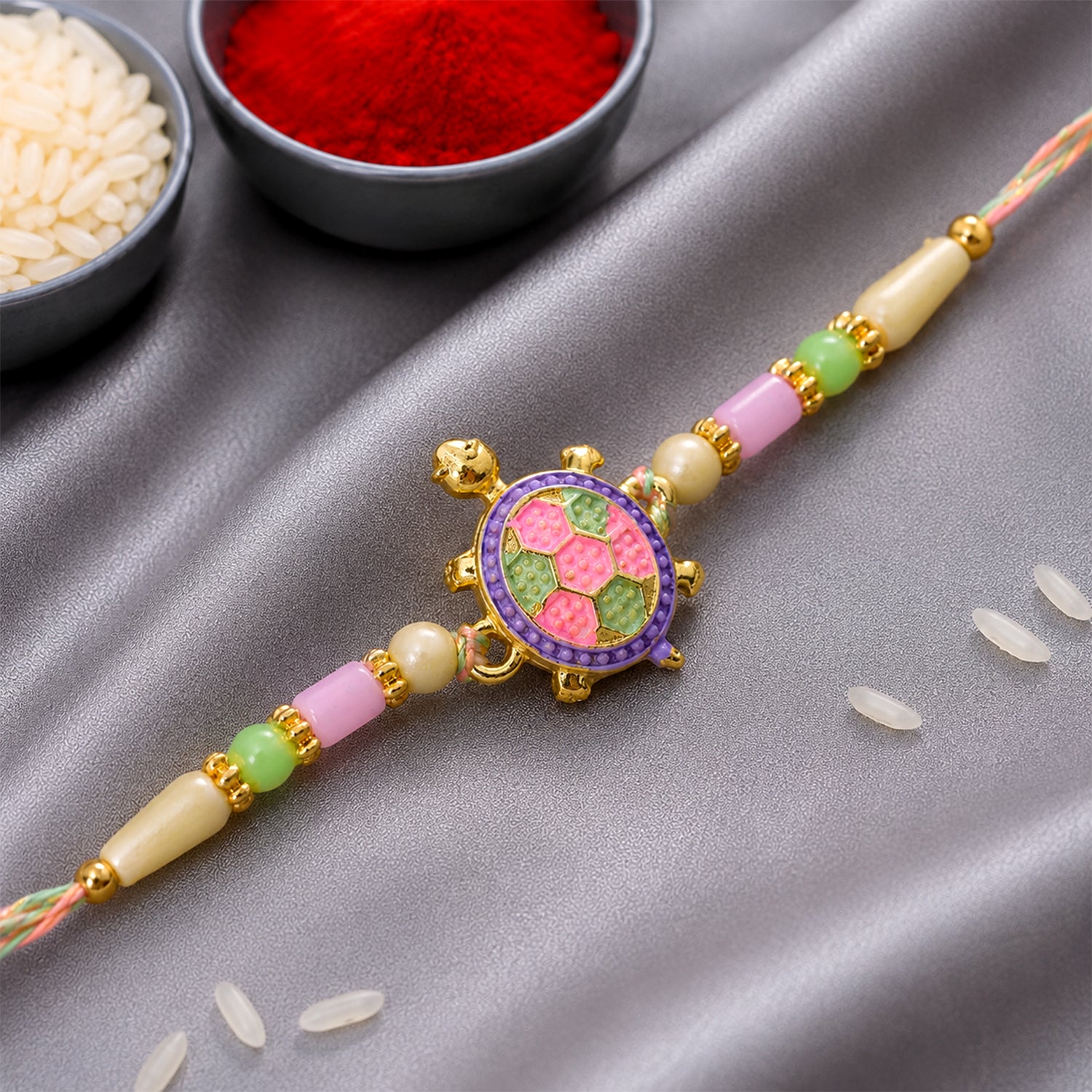 Enamel Tortoise Pendant Rakhi with Pastel Beads