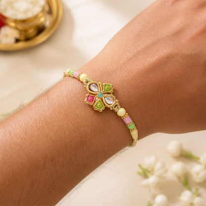 Floral Cross Kundan Pendant Rakhi with Multicolor Beads