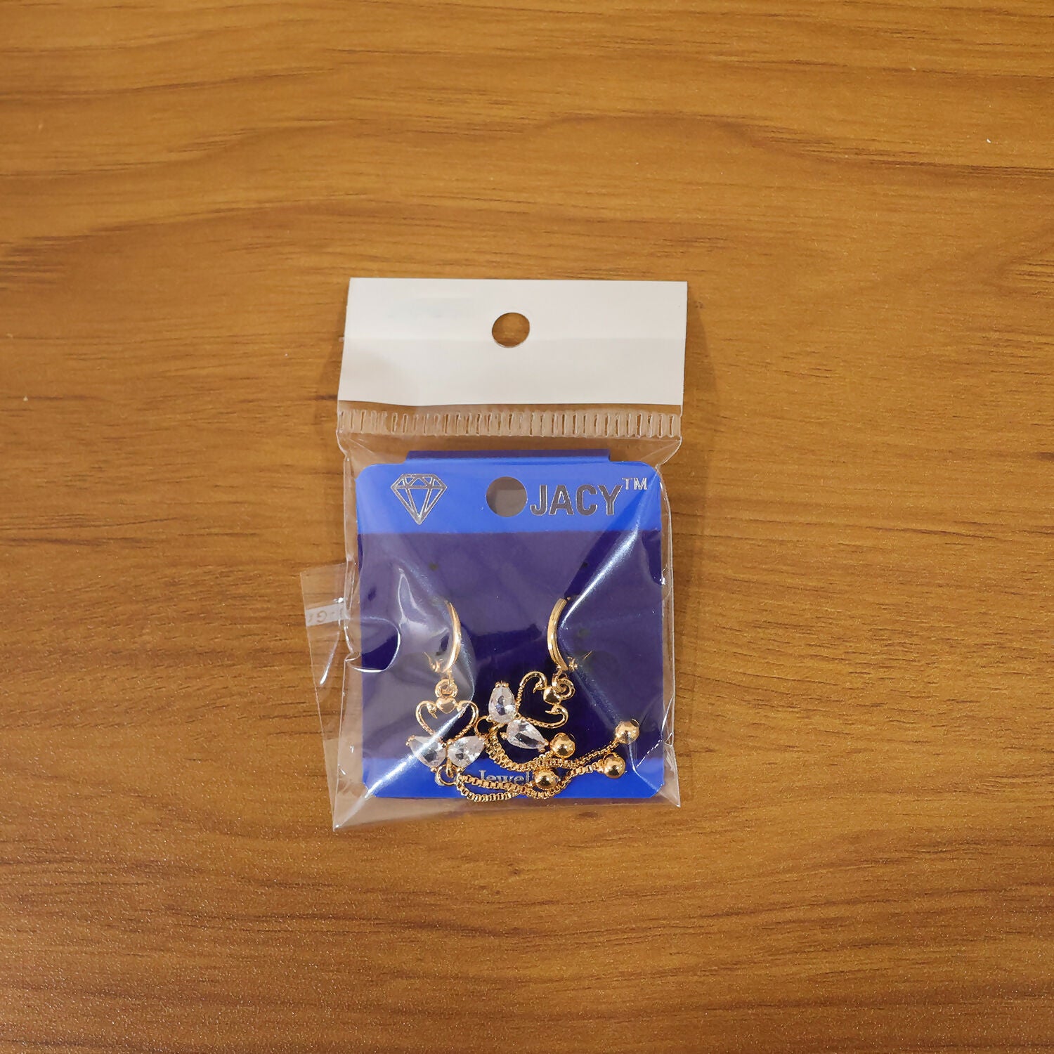 Pair of swan crystal heart dangle earrings with dual chain drops and polished gold beads
