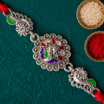 Festive Rakhi showcasing Petal Floral Medallion, pearl accents and bead line for Gift