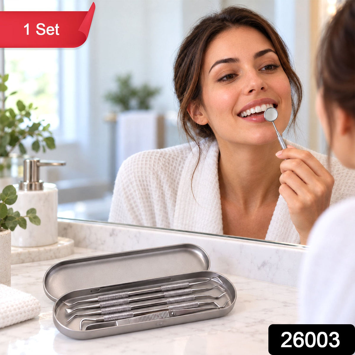 A woman in a white robe smiles while using a dental mirror to examine her teeth, with the tool set in its case on a marble