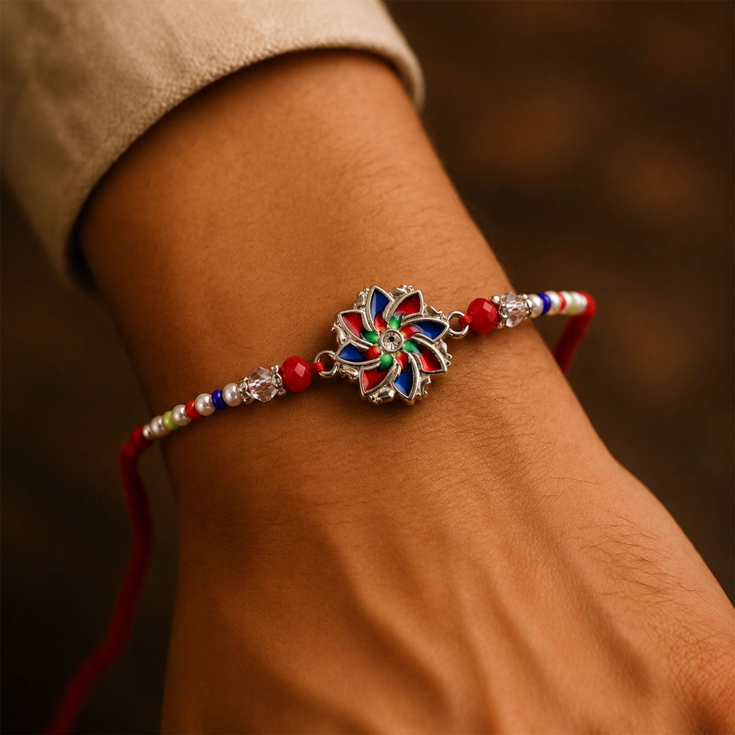 Multicolor Floral Chakra Rakhi with Pearl Beads, Roli Chawal Coin and Peacock Card Packing