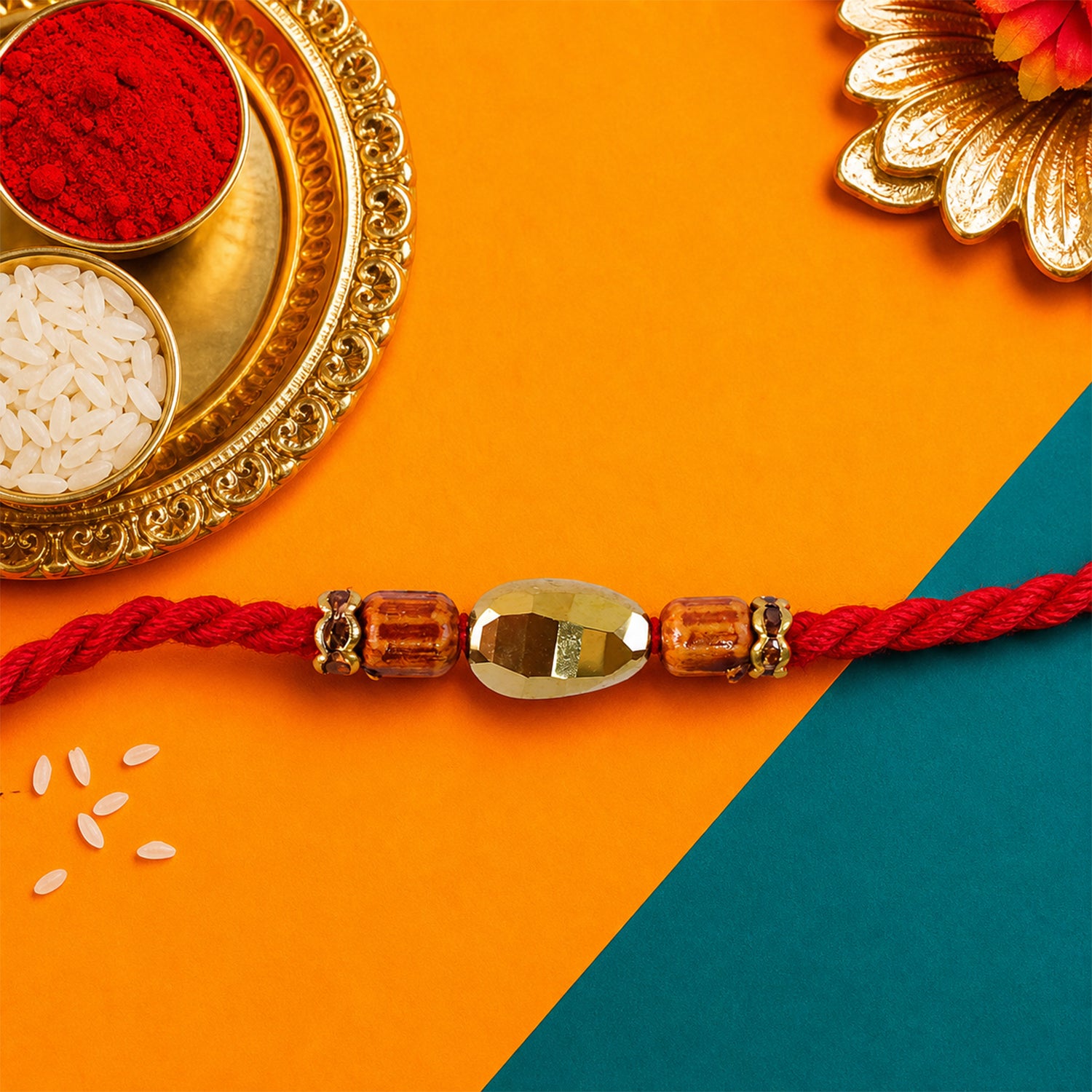 Red Thread Rakhi with Golden Oval Bead and Wooden Bead Accents