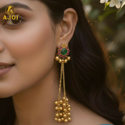 Side view of gold-plated ear cuff chain earrings with dual chains and ghungroo bells