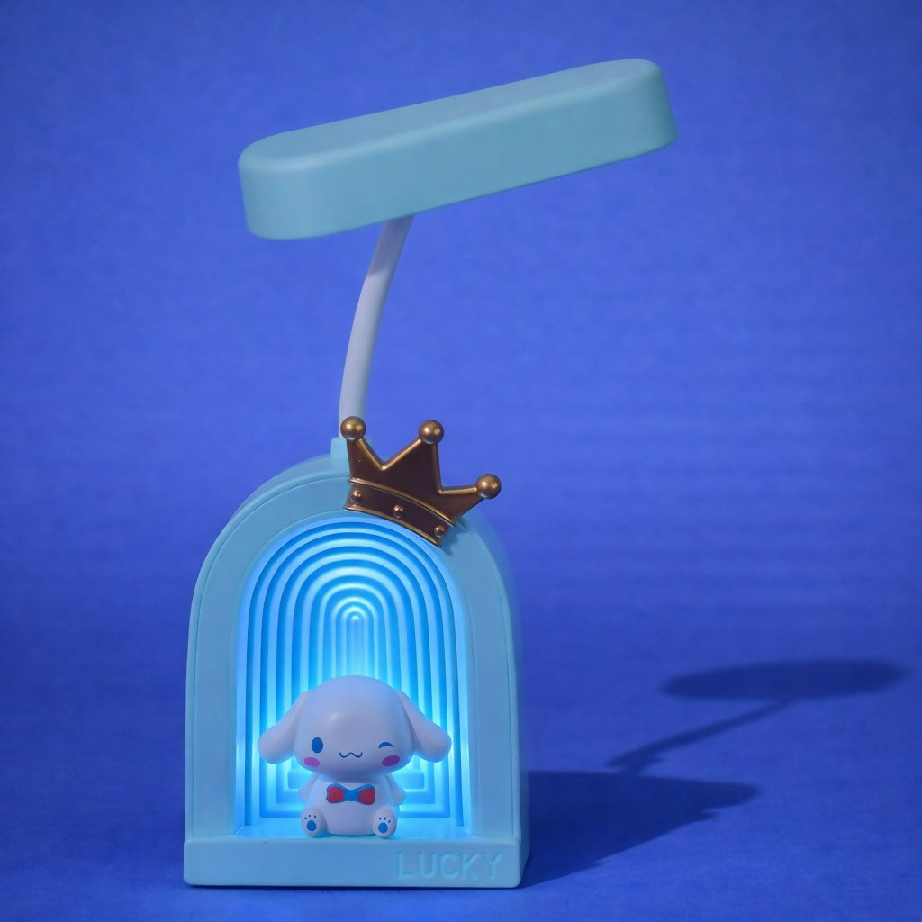 Side view of Bunny LED desk lamp with warm night light glow
