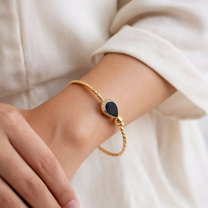 Openable feature of the gold plated black stone kada bracelet