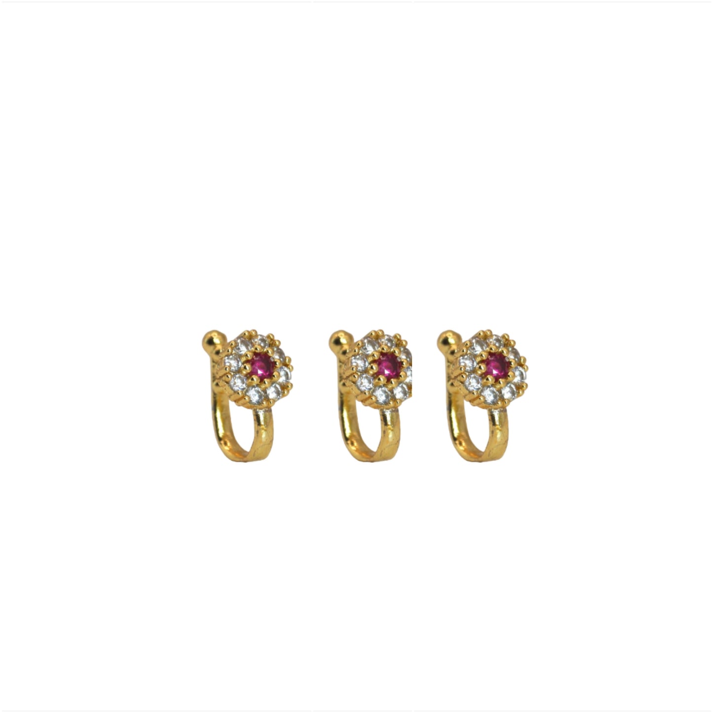 Close-up view of gold plated floral clip-on nose ring with red and white sparkling stones