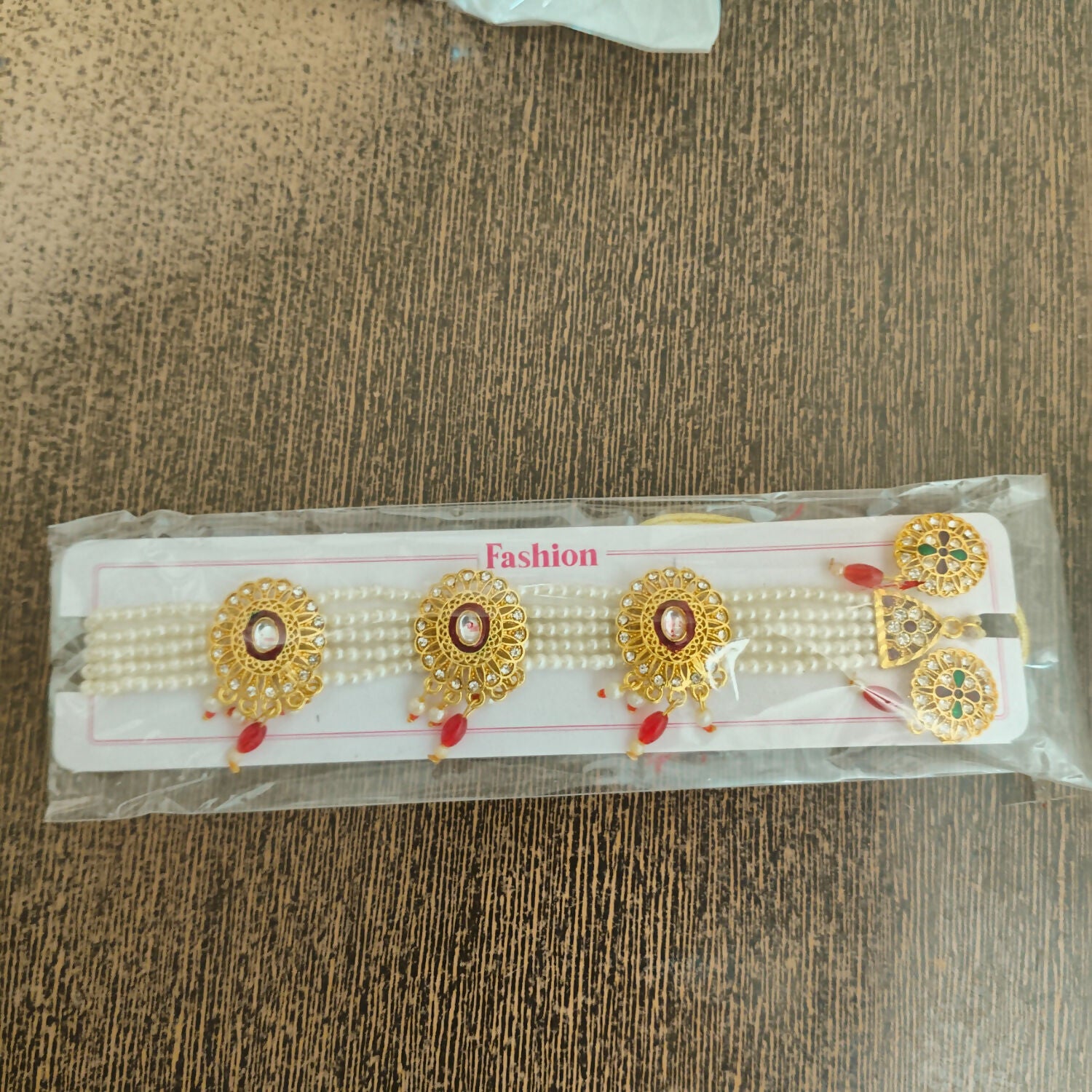 Traditional Gold-Plated Kundan Pearl Choker Necklace Set with Emerald red Drops and Matching Earrings