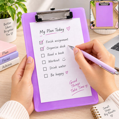 Hands hold a purple clipboard with a daily plan checklist, using a purple pen to mark off tasks.