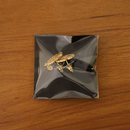 Floral Inspired Gold Stud Earrings With Central Stone And Teardrop Dangle Detail