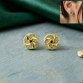 Gold Stud Earrings – Intricate Spiral Pattern with Red Stone
