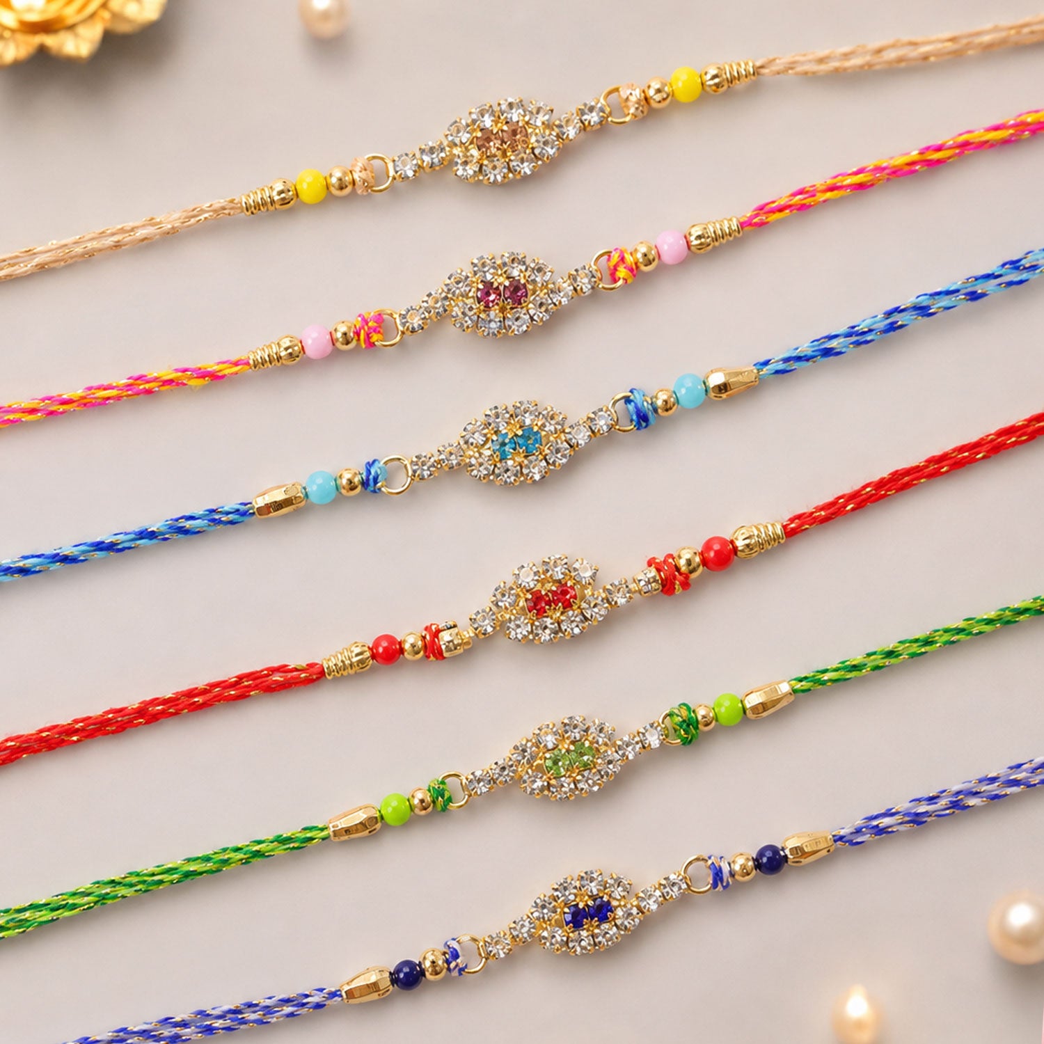 Oval Halo Motif Rakhi with AD Stones for Brother (Pack of 6)