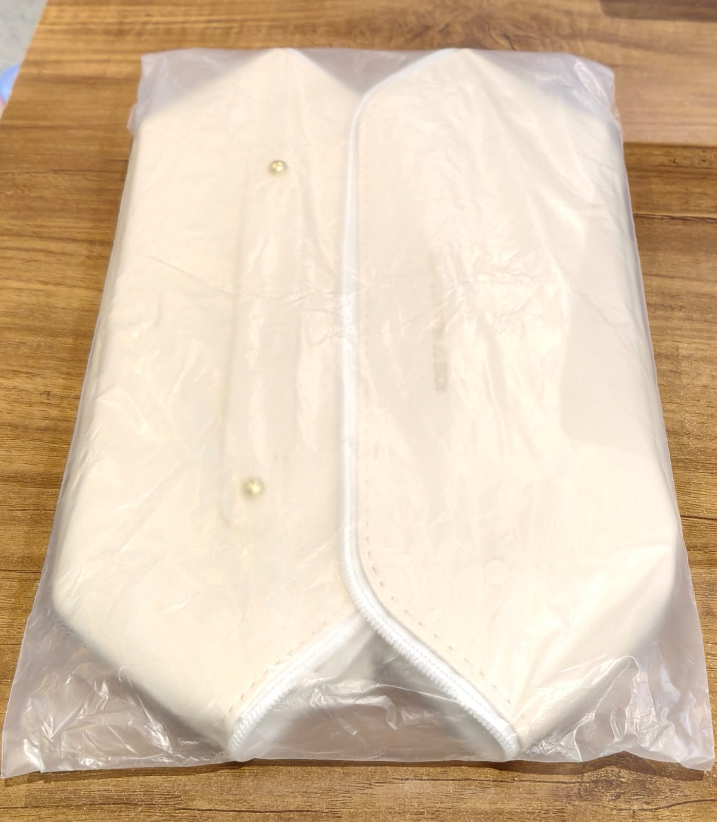 Portable makeup and toiletry organizer pouch in cream color