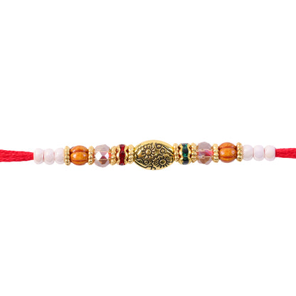 Red Thread Rakhi with Floral Gold Oval Charm and Multicolour Beads