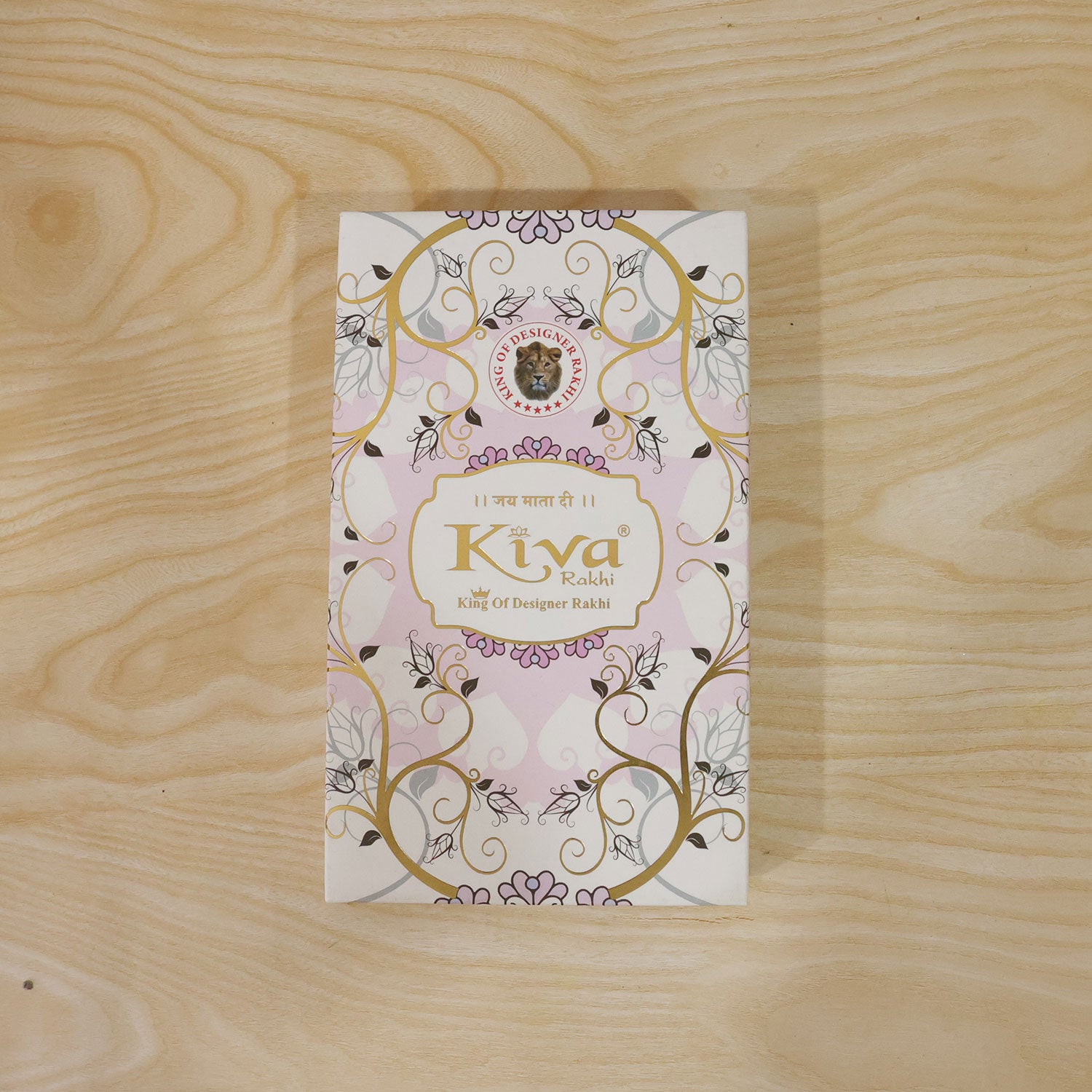 Crystal Cross Star Rakhi with Soft Pink Beads, Roli Chawal Coin and Elegant Gift Packing