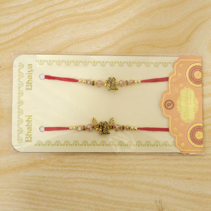 Radha Krishna Couple Rakhi Set with Pink Crystal Beads and Antique Leaf Charm Gift