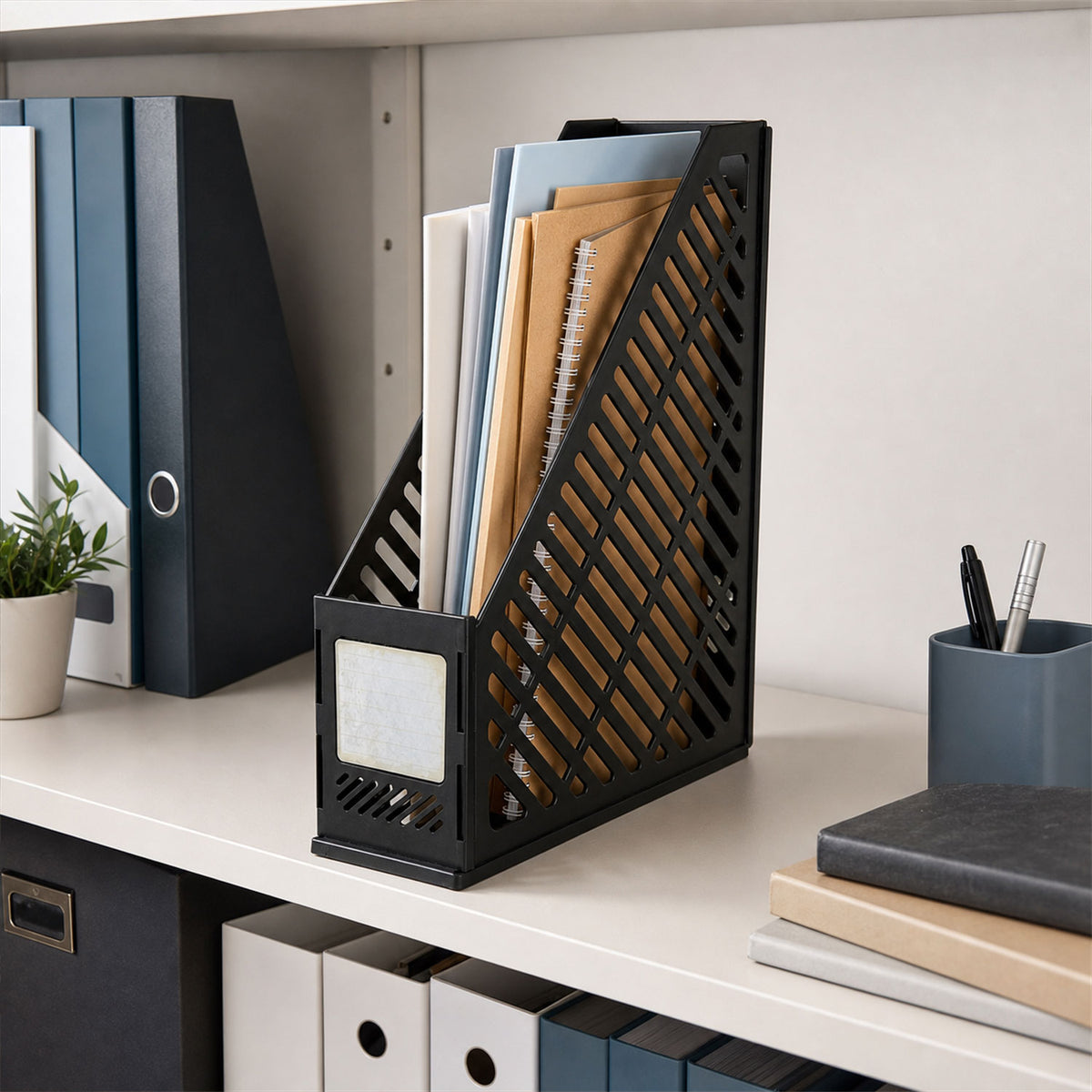 Simple plastic vertical file holder standing on a work desk