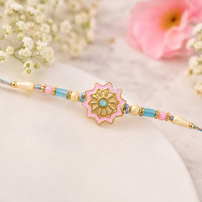 Pastel Floral Charm Rakhi with Pink Blue Beads and Elegant Festive Gift Styling Ideas