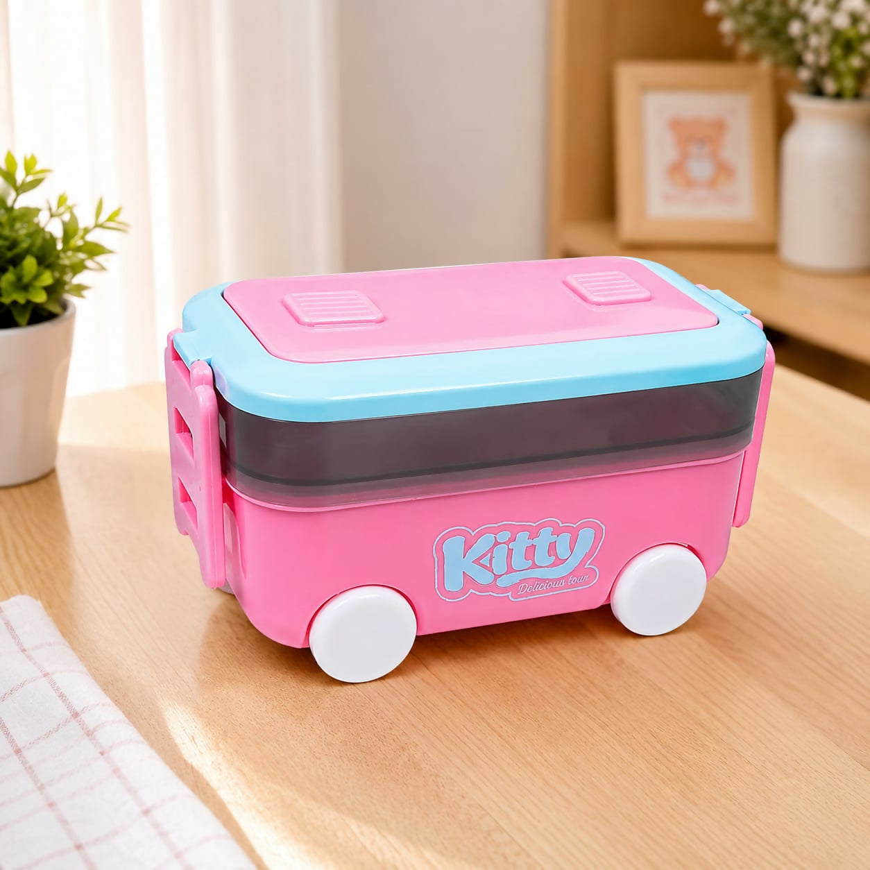 Colorful toy car lunch box for kids with vibrant pink and pastel green